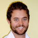 Portrait photograph of Dr Adam Olarenshaw